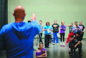 “Working” cast listens for direction. ALISSA HASTINGS | THE HARBINGER