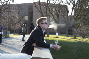 ICC student Nick Borton, enjoying a cigarette. LAUREN MARRETT | THE HARBINGER