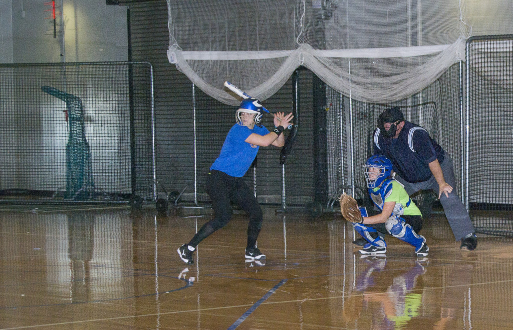 Until the weather warms, the ICC softball team has been limited to practicing inside the CougarPlex. TERESA WILLIAMS | THE HARBINGER
