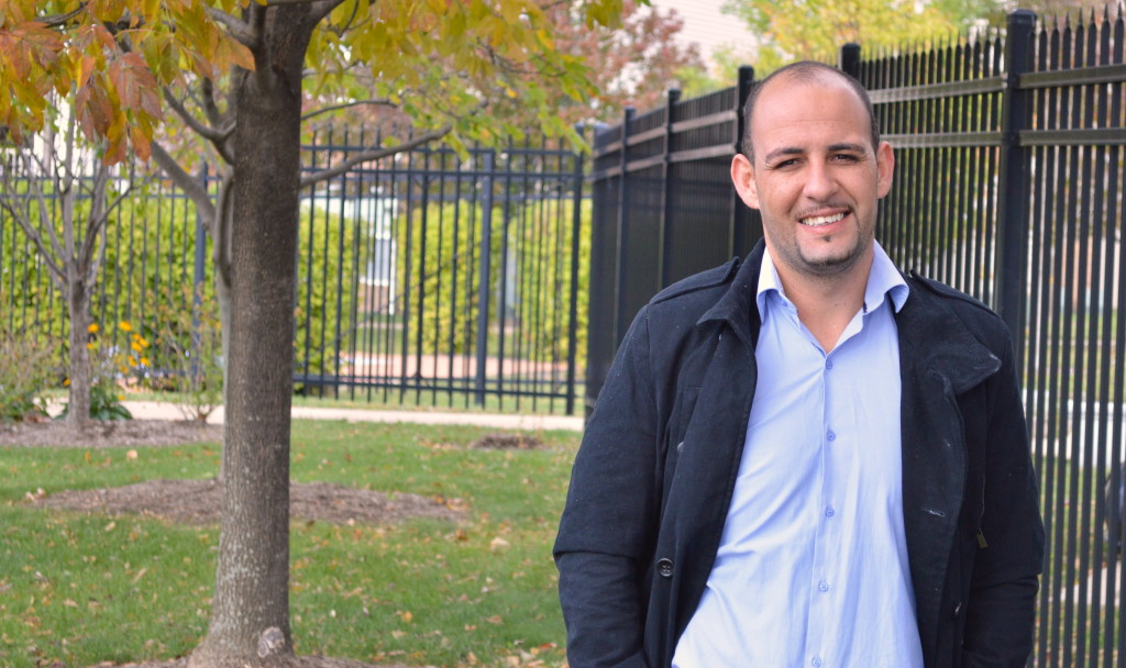 ICC's visiting Fulbright Scholar for the 2014-2015 academic year, Mohammed Kasmi, photographed in front of WoodView Commons, where all visiting Fulbrights stay. REID HARMAN | THE HARBINGER
