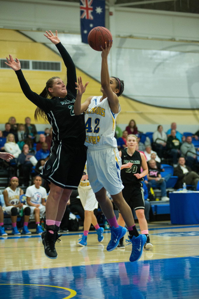 Destiny Ramsey goes for a basket in a February game against Parkland. MARK NYCZ | THE HARBINGER