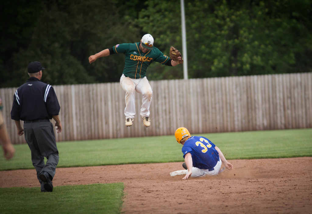 Freshman Casey Danley slides into second as the Parkland second baseman comes down from a catch. MARK NYCZ | THE HARBINGER