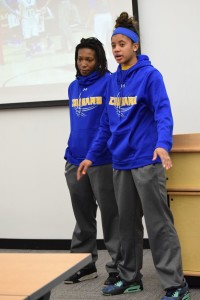 Photo by Christian Harr. Destiny Ramsey and Jemia Carpenter speak in front of a group of their fans.